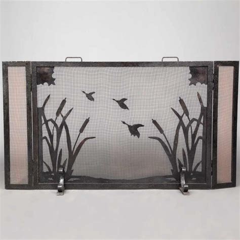 Or you can go with a more exotic style. Art Deco Style Iron Three-Panel Folding Fireplace Screen ...