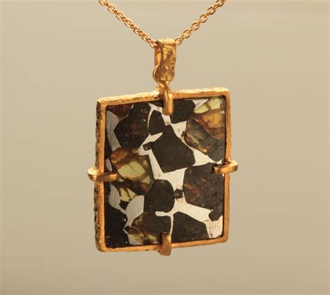 Even those that look similar to terrestrial rocks (stony meteorites). Seymchan Pallasite Meteorite Pendant