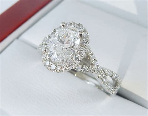 Oval Diamond Halo Ring With Cross Shank Style4312 Diamondnet