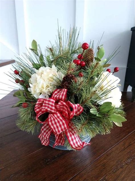21 Christmas Floral Arrangements To Liven Up Your Holiday Diy Christmas