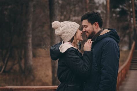 Loving Young Couple Happy Together Outdoor On Cozy Warm Walk In Forest