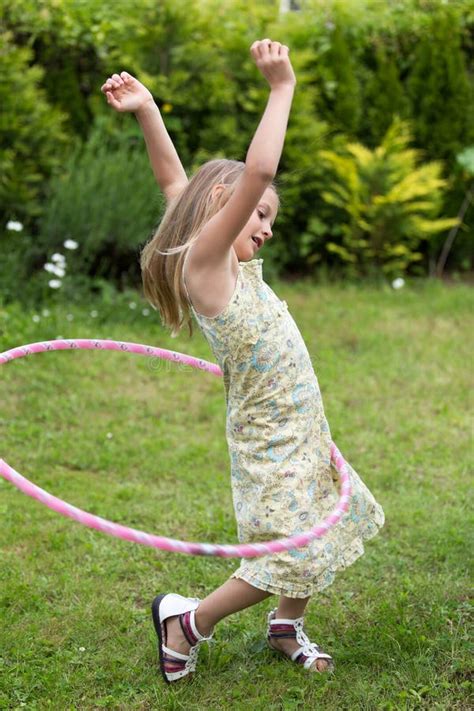 Little Girl Playing With Hula Hoop Stock Image Image Of Childhood