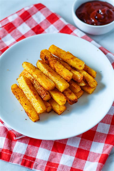 Crispy baked polenta fries are exactly the delicious and easy nosh you need for your next gathering. polenta fries 6-1 - Zen & Spice