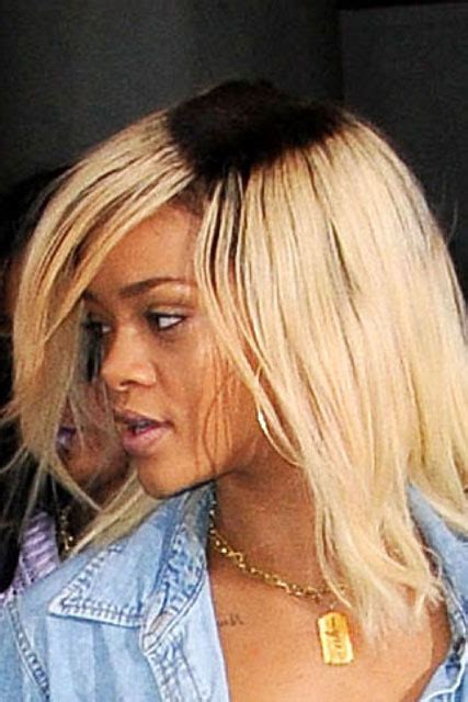 Rihanna Debuts Unusual New Dark Roots Hairstyle
