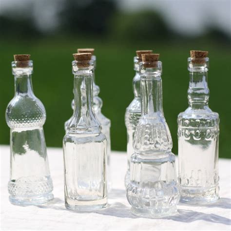 Set Of Six Glass Bottle Vases With Cork Stoppers By The Wedding Of My Dreams