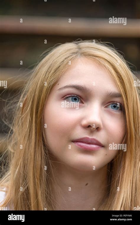 Close Up Candid Portrait Of Beautiful And Pretty 15 Year Old Teenage