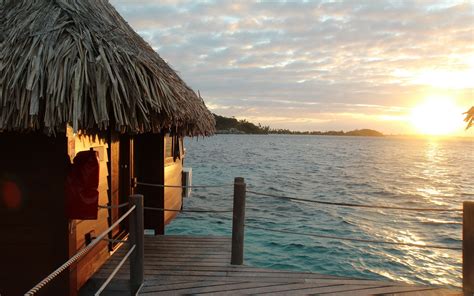 Panorama image of a tropical bora bora landscape with green otemanu mountain behind a luxury resort in the turquoise lagoon of the island near tahiti overwater bungalows bora bora island, french polynesia. bora bora landscape wallpaper - Bing Images