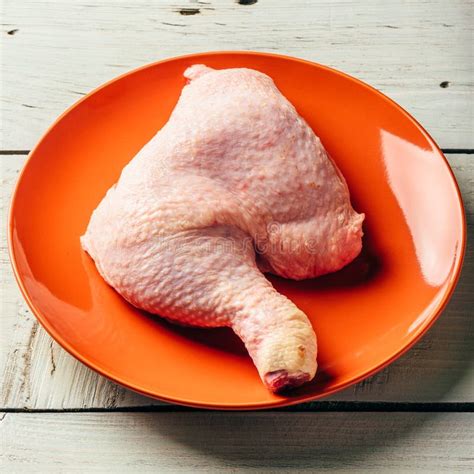 Chicken Leg On Orange Plate Stock Photo Image Of Fresh Bird 134146578