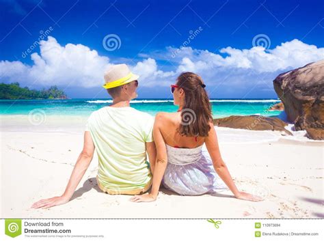 Young Couple Having Fun At Tropical Baie Lazare Beach At Mahe Island