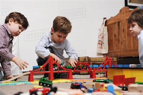 Children Playing With Toys Together Stock Photo Dissolve