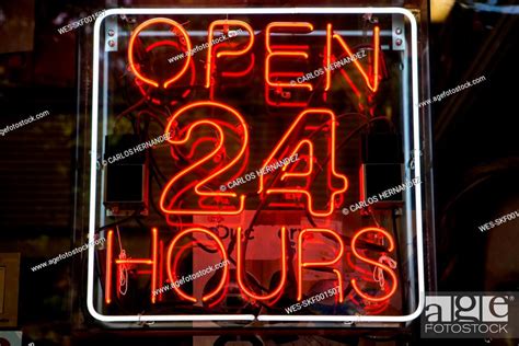 Neon Sign Open 24 Hours Stock Photo Picture And Royalty Free Image