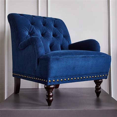 Every chair, armchair or settee upholstered in velvet benefits from the soft glimmer of the material. Chas Navy Blue Velvet Armchair | Velvet armchair, Blue ...