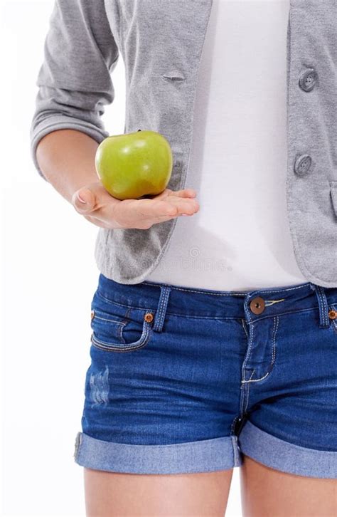 Fresh Fruit For Healthy Skin A Young Woman Holding An Apple Isolated