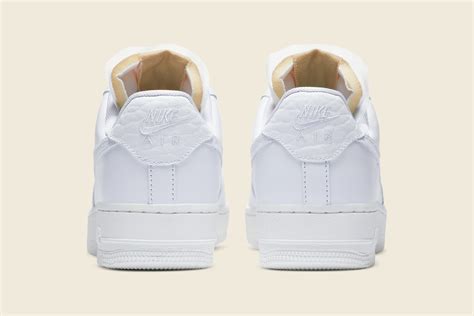 Wmns air force 1 pixel silhouette leather upper perforated toe box padded collar af1 logo patch on tongue and rear swoosh on side panels tonal stitching flat cotton laces nike air sole unit rubber outsole style: Nike WMNS Air Force 1 - 'Bling' | Shelflife