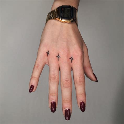 Tiny Sparkle Tattoos By Jessica Rubbish Inked In Between The Knuckles