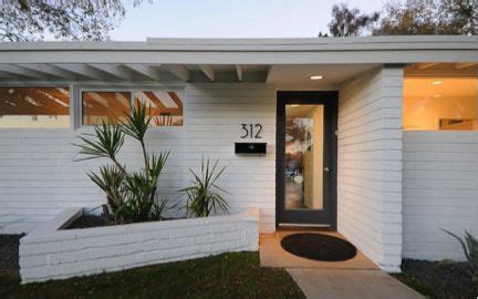 The rotational torevaor slump type block becomes. Simple mid century modern exterior... painted white slump ...