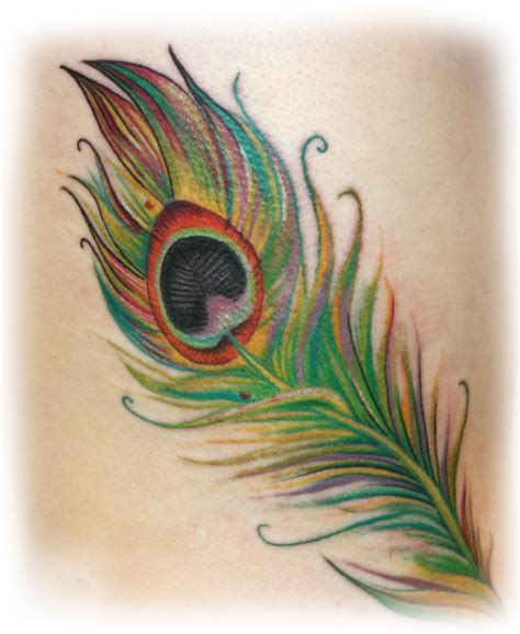 Peacock feather tattoo | Peacock feather tattoo, Peacock feather tattoo meaning, Feather tattoos