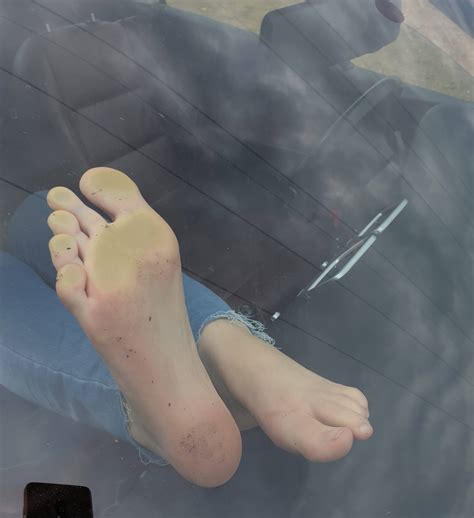 female feet on car windshield ii by inssaniity on deviantart