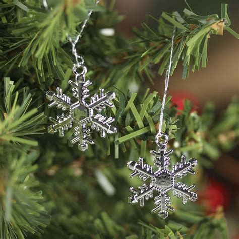 Compare saterland frisian sneeflokke (snowflake). Silver Snowflake Ornaments - Snow - Snowflakes - Glitter ...