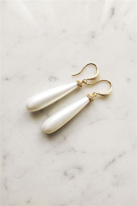 Elegant And Unique These Long Pearl Teardrop Earrings Are Perfect For