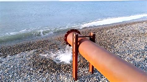Weybourne Marshes Drainage Waterpipe On The Beach North Norfolk Youtube