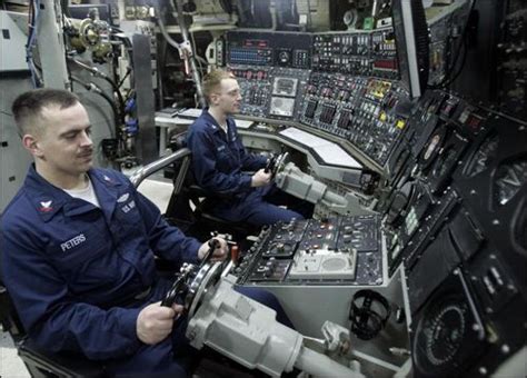 Nuclear Submarine Interior Navy Officers At A Control Room Of A Us