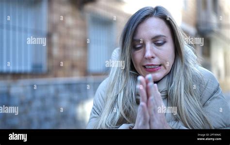 Young Blonde Woman Rubbing Hands For Cold At Street Stock Photo Alamy