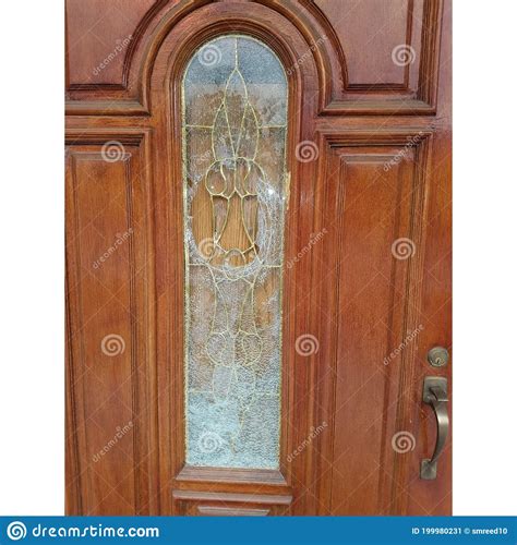 Door With Shattered Glass And Chains Royalty Free Stock Image 209314702
