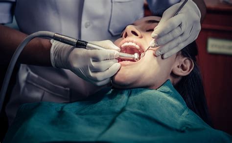 Free Photo Dentists Treat Patients Teeth