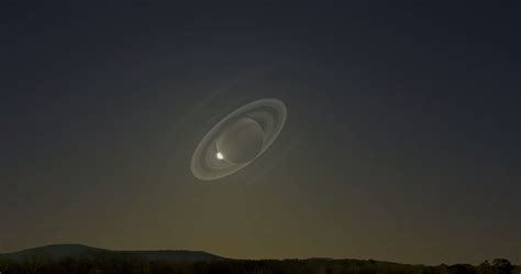 Heres What It Would Look Like If Saturn Flew Past Earth