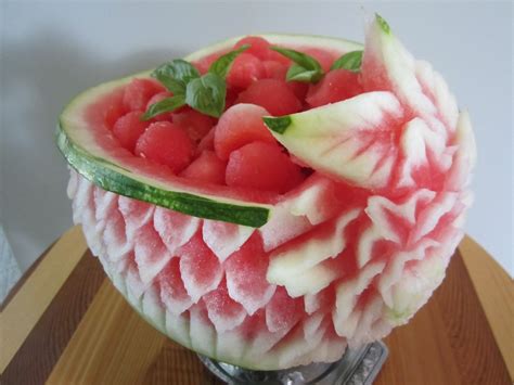 Use a ice cream scope dip out half of the water melon. Watermelon Basket - Thai Creations
