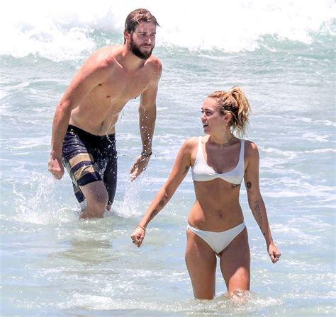 Miley Cyrus Liam Hemsworth Hit The Beach Pics