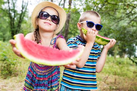 Children Eating Watermelon On A Park Stock Photo Image Of Funny