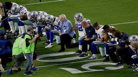 Owner Jerry Jones And Cowboys Kneel Before National Anthem Against
