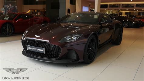 Later in 2007, a new version of. DBS Superleggera in Divine Red - Aston Martin Leeds - YouTube
