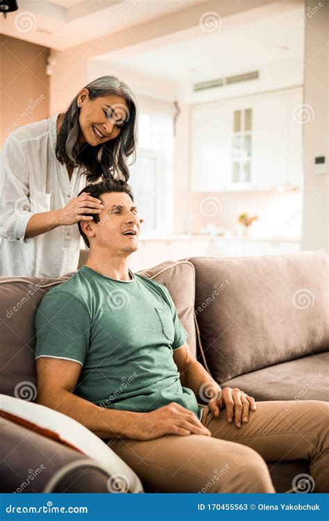 Pretty Caring Wife Doing Massage To Her Husband Stock Image Image Of