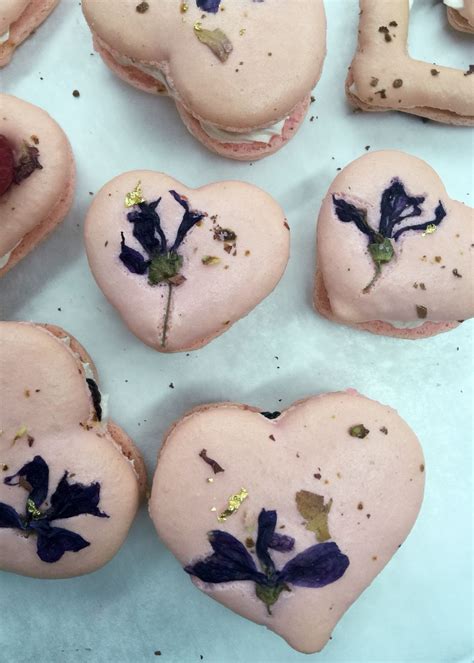 Cook it up like spinach or eat it raw. Macaron hearts with dried edible flowers, sandwiched with ...