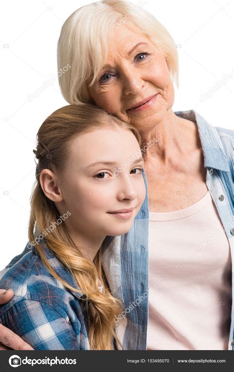 Grandmother And Granddaughter Hugging — Stock Photo © Natashafedorova
