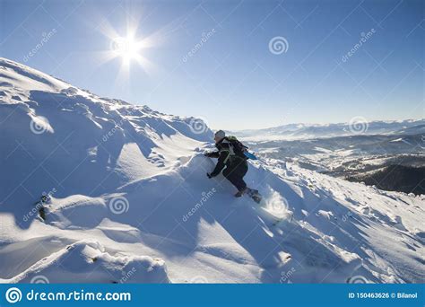 Tourist Hiker Climber In Winter Clothing With Backpack Climbing