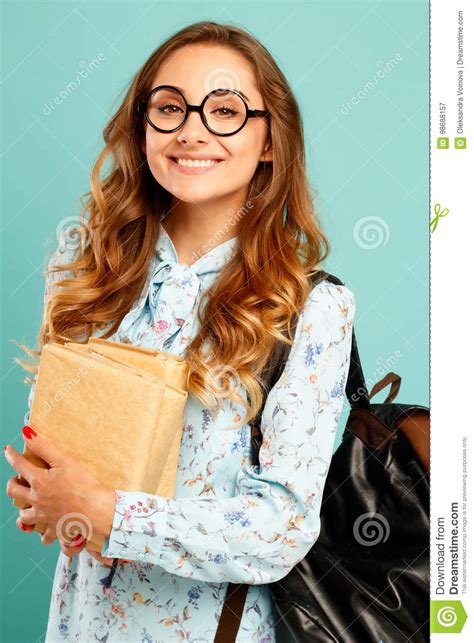 Pretty Smiley Girl Wearing Glasses Pretty Student Holding Books Stock
