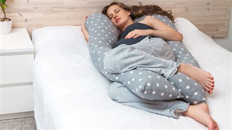 The Benefits Of Sleeping With A Pillow Between Your Legs Sleep Number Ng