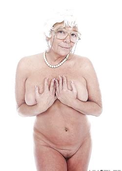 Granny Pornstar Karen Summer Modelling Fully Clothed Before Stripping Naked