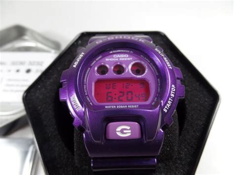 The black base is marked with a purple spine design on the strap accompanied by. Casio G Shock DW6900 Purple Band Purple Face #GShock # ...