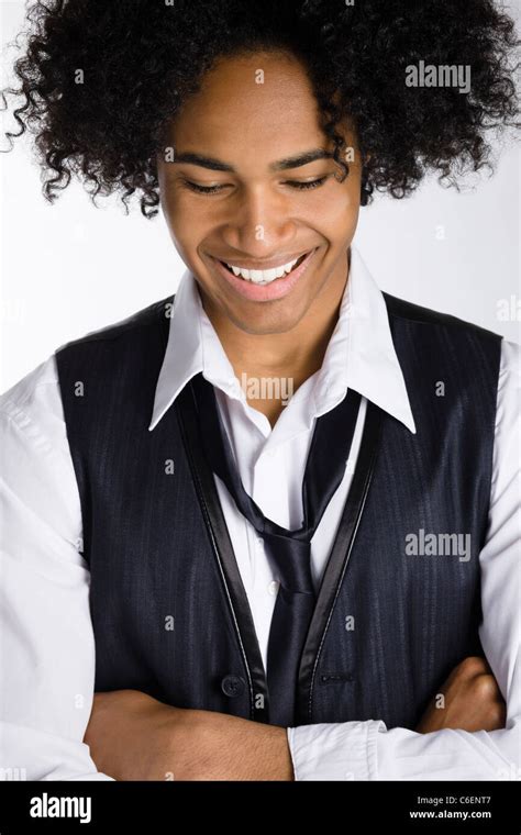 Smiling Mixed Race Man With Arms Crossed Stock Photo Alamy
