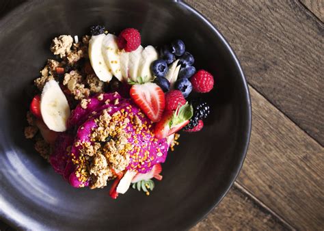 Hylocereus flowers at night, with large blooms arising from stem margins, along. Healthy Pitaya Bowl Recipe | POPSUGAR Fitness