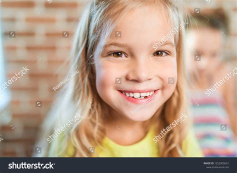 Beautiful Little Sisters Smiling On Background Stock Photo 1252005631