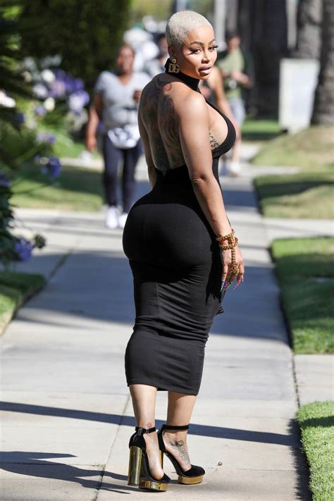 Blac Chyna Flaunts Her Curves In A Form Fitting Black Dress While