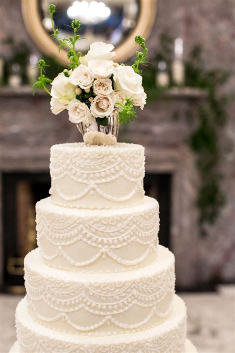 Classic White Wedding Cake With Floral Arrangement Wedding Cakes
