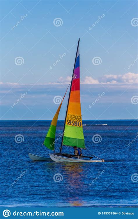 Rainbow Sail On Blue Water Editorial Stock Image Image Of Beach
