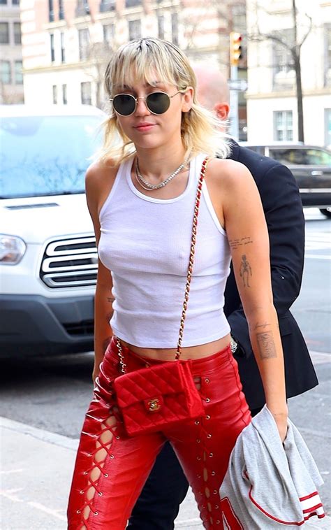 Miley Cyrus â Braless Nipples in Sheer White Top Out in New York 1